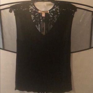 Black, flowy tank with lace and open-mesh back ❤️